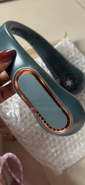 It’S a Neck Fan, Suitable for People That Hav Small Spaces or Shops