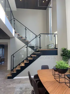 Stand Off Base Glass Stair Railings Installed With Matt Black Profile