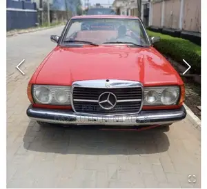 Vintage Mercedes Benz W123 Red for Hire