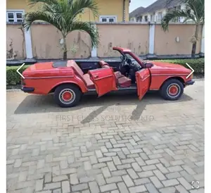 Vintage Mercedes Benz W123 Red for Hire
