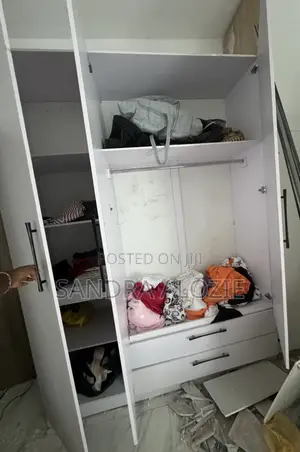 Triple Door Wardrobe With Drawers