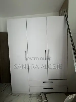 Triple Door Wardrobe With Drawers