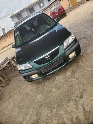 Mazda 323 2004 Green