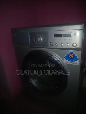 Neat Used Washing Machine With the Holes