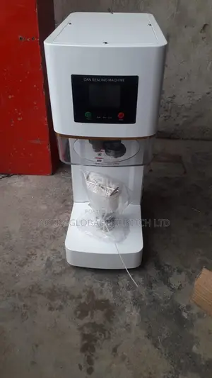 Can Sealer Machine.