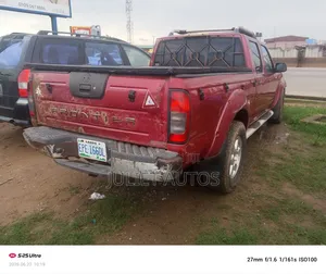 Nissan Frontier 2003 Red