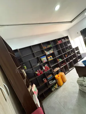 4 Food/Provision Store Racks With an Office Table