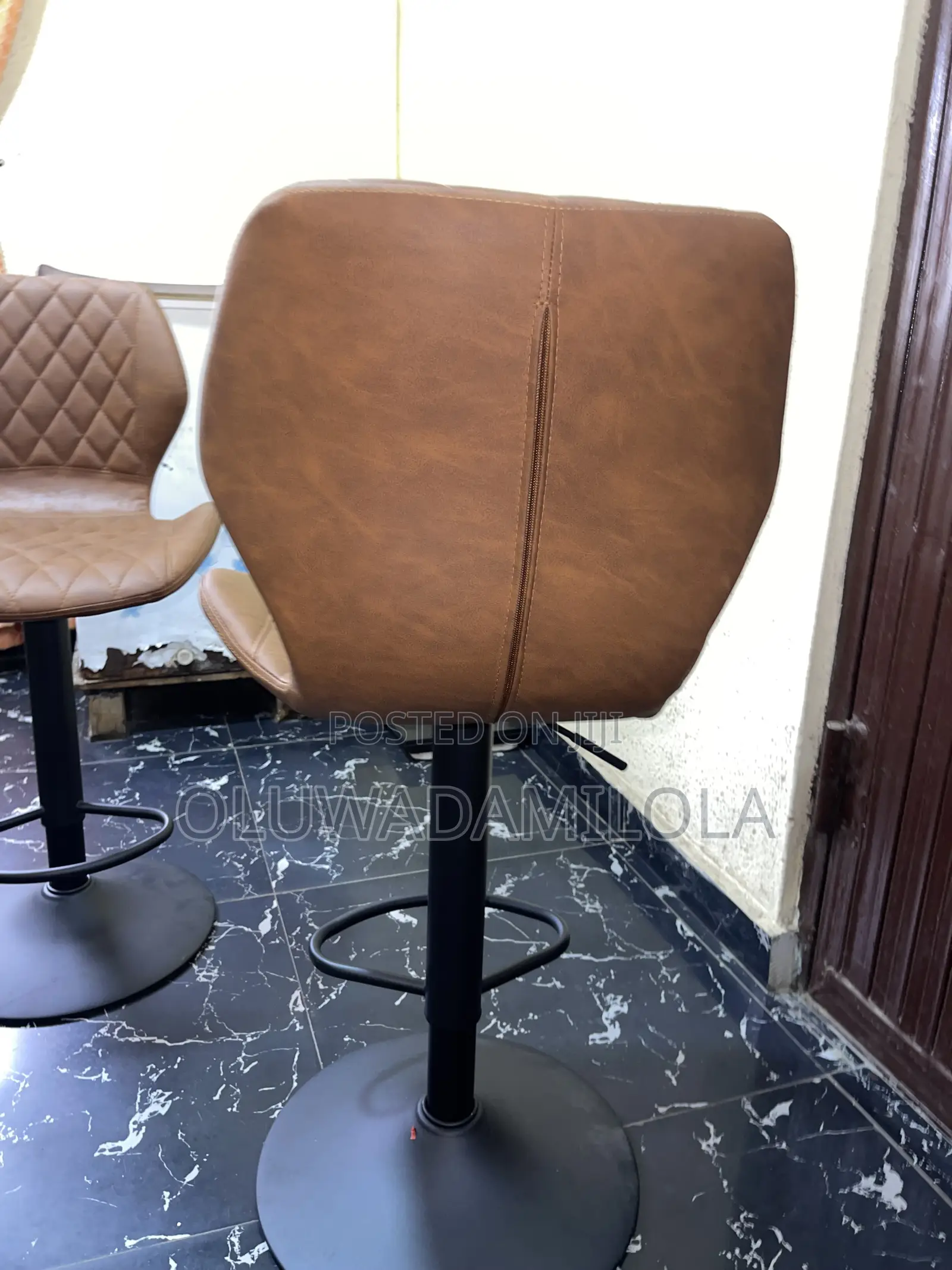 The Saddle Luxe Adjustable Bar Stool