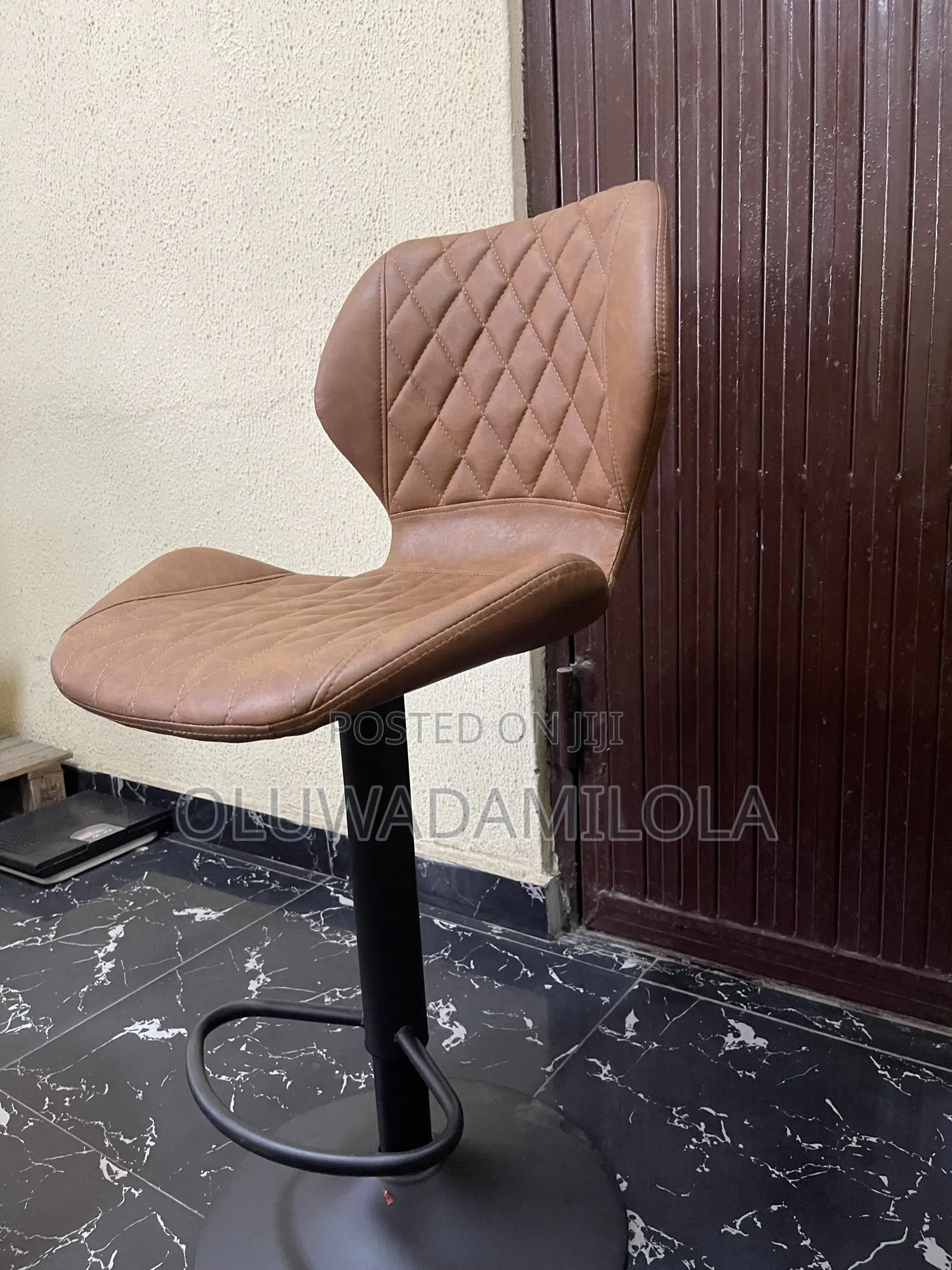 The Saddle Luxe Adjustable Bar Stool
