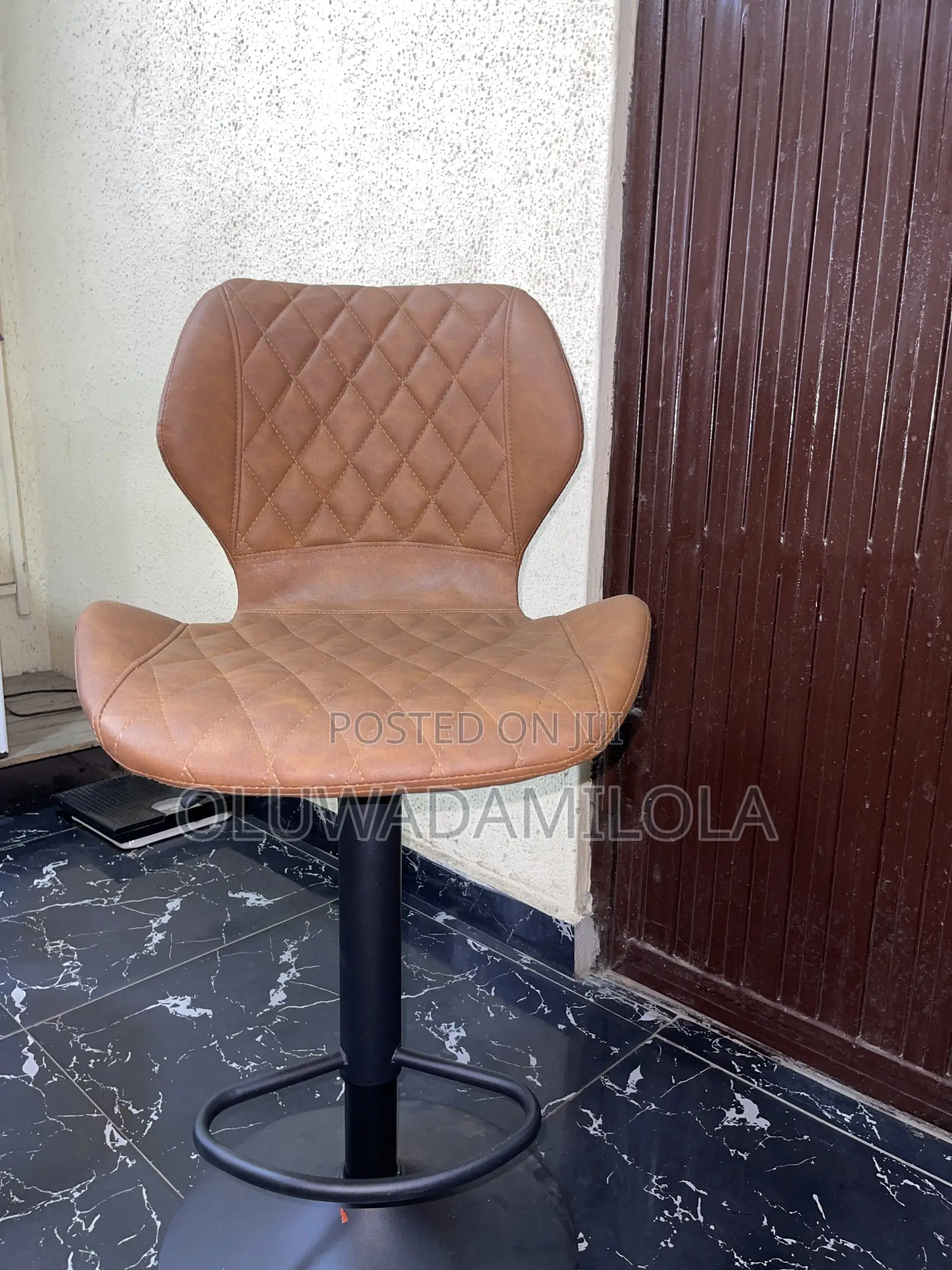 The Saddle Luxe Adjustable Bar Stool