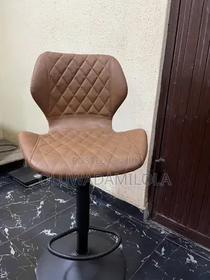 The Saddle Luxe Adjustable Bar Stool