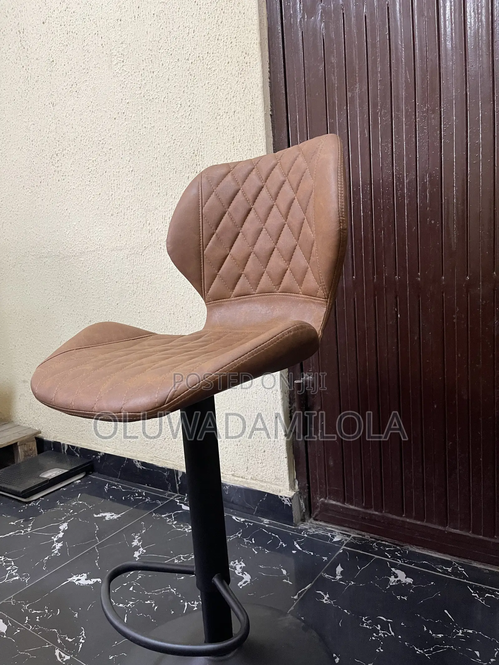The Saddle Luxe Adjustable Bar Stool