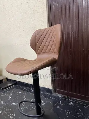The Saddle Luxe Adjustable Bar Stool