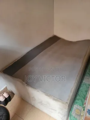 Neatly Used 3.5 X 6 Upholstered Wooden Bed Base