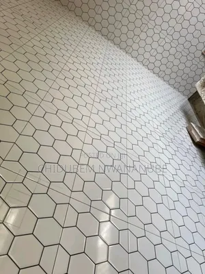 Kitchen Wall Tiles Installation Ongoing With 400by25