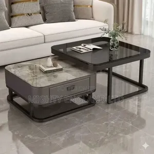 Nested Coffee Table Set With A Dark Tempered Glass Top On One Unit