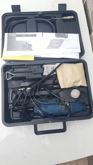 Tip Craft Rotary Tool Kit Featuring A Blue Corded Multi-tool.