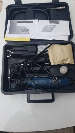 Tip Craft Rotary Tool Kit Featuring A Blue Corded Multi-tool.