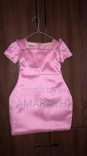Exaggerated Hip Dress With White Pearls