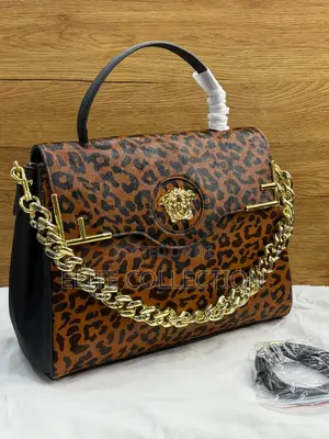 Fendi Versace Quality:- Luxury Material:- Leather Size:- Big