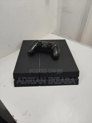 Playstation 4 With Controller and 4 Games