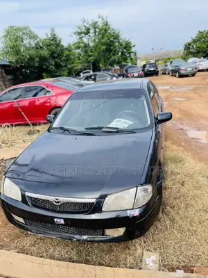 Mazda 323 2004 Black