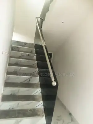 Tinted Frameless Glass Staircase and Balcony Railing