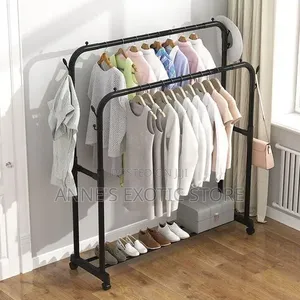Heavy-Duty Double Pole Clothes Rack With Wheels