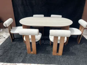 Oval Dining Set – 6-Seater With Stone-Finish Top Boucle Upholstered