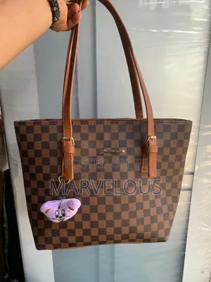 These Bags Are Structured Tote Handbags, With an Elegant Design.