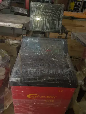 Appears To Be A Gal Glorai C366 Wheel Balancer, A Machine Designed