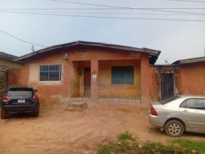 Full Plot of Land With Dilapidated Structure