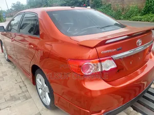 Toyota Corolla S Special Edition 4dr Sedan (1.8L 4cyl 4A) 2013 Orange