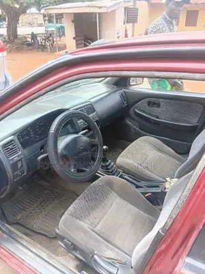 Nissan Almera Tino 2002 Maroon