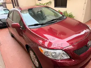 Toyota Corolla LE 4dr Sedan (1.8L 4cyl 4A) 2010 Red