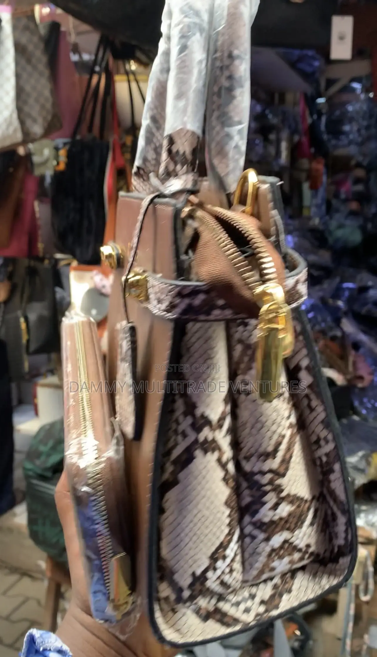 Versse Handbag Features a Brown Leather Exterior
