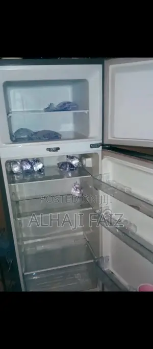 Double Door Hisense Refrigerator. Good as New, Sharp and Clean.