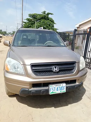Honda Pilot LX 4x4 (3.5L 6cyl 5A) 2004 Gold