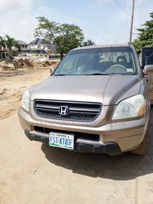 Honda Pilot LX 4x4 (3.5L 6cyl 5A) 2004 Gold