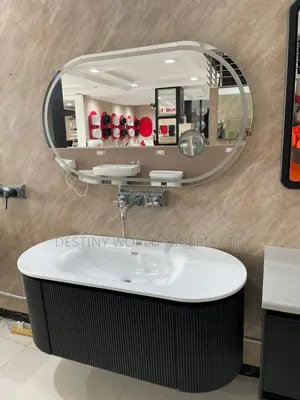 Sweethome Black Bathroom Fluted Vanity and an Oval Led Mirror