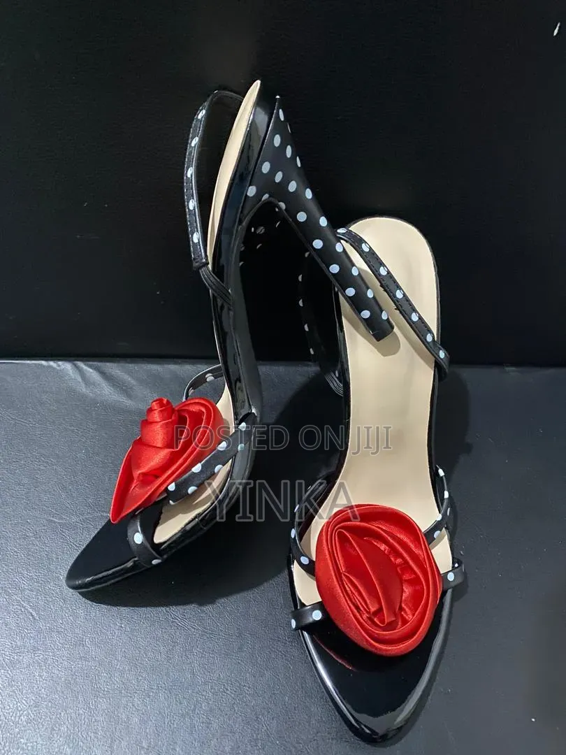 Sandal Heel With a Red Rose