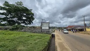 A Full Standard Plot of Land Facing the Main Road at Moniya Ibadan