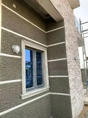 Painting Gravitex and Tyrolean