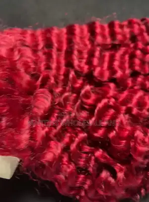 Burgundy-Colored Human Hair Extensions Featuring a Deep Wave or Curl