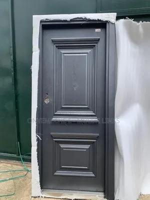 Dark Gray Favida Security Door With a Decorative Panel Design