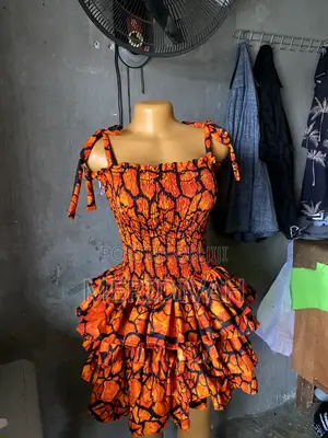 Orange Smocked Tiered Mini Dress | Custom Made | Meridivah Fashion
