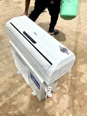Very Clean 1.5hp Midea Air Conditioner With Indoor Hanger and Remote