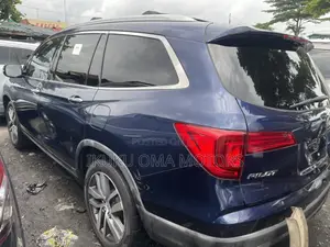 Honda Pilot Touring 4dr SUV 4WD (3.5L 6cyl 9A) 2017 Blue