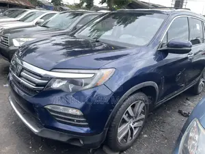 Honda Pilot Touring 4dr SUV 4WD (3.5L 6cyl 9A) 2017 Blue