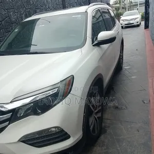 Honda Pilot Touring 4dr SUV (3.5L 6cyl 9A) 2017 Off white